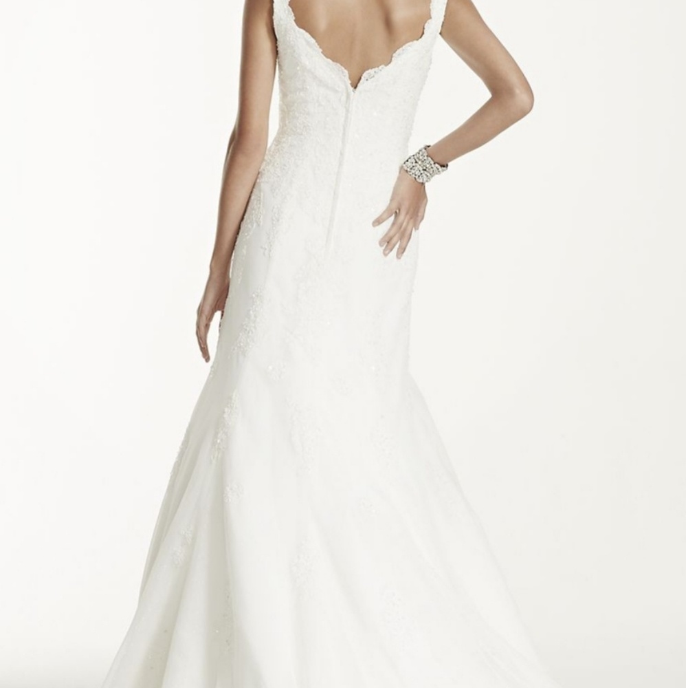 Never used ivory wedding dress size 4P